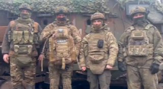 Передача медицинского рюкзака военным