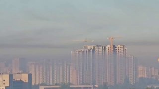 Дым над Киевом после прилёта по складу
